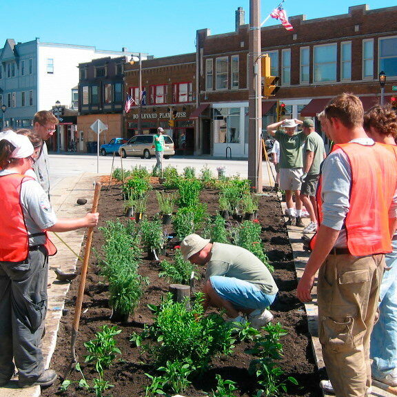 Our research suggests that a community group taking positive action in a very ‘ordinary’ town centre is easier for most people to identify with than a crowd of people waving placards.